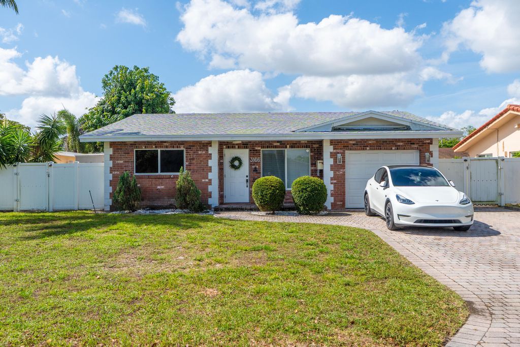 Photo of 3166 NW 68th Street, Fort Lauderdale, FL 33309 (MLS # B26042327)
