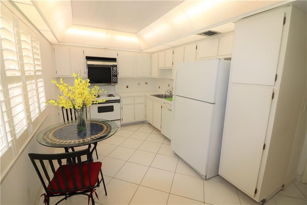 Photo of 3505 Oaks Way #409, Pompano Beach, FL 33069 (MLS # F10297967)
