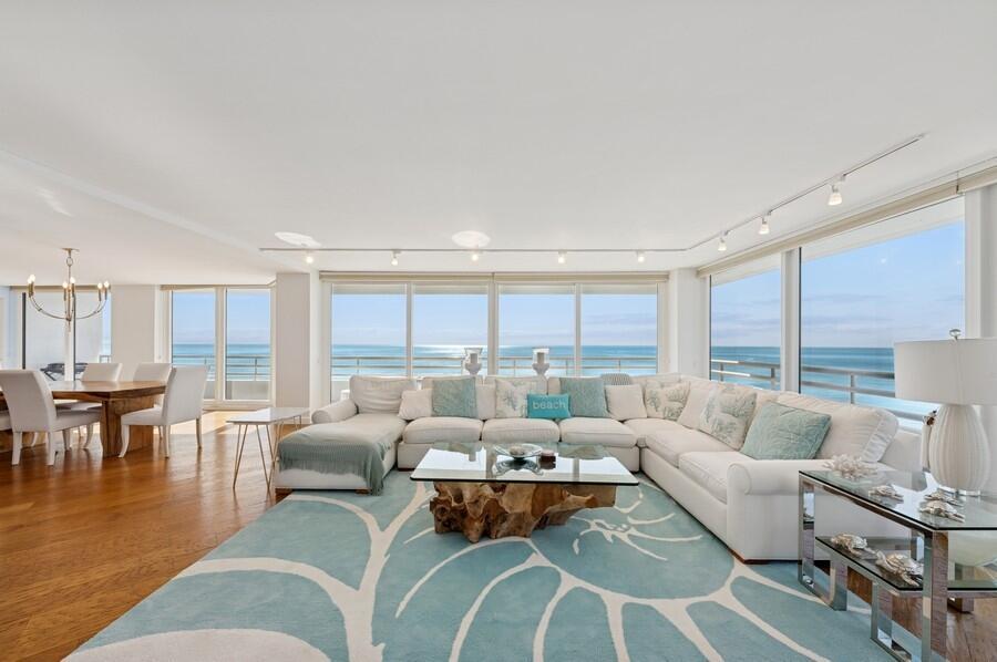 Upon entering this fabulous residence you'll be dazzled by the sparkling ocean views. This wrap-around corner unit has breathtaking, panoramic views from every balcony. This magnificent residence has been renovated with the finest upgrades... a contemporary kitchen with sleek white cabinetry, gorgeous custom countertops and glass backsplash; there are hardwood floors in the common areas and plush carpet in the bedrooms; each bedroom has it's own stunningly renovated ensuite bathroom; there is custom lighting throughout, all impact glass windows and two parking spaces. The Addison On The Ocean, N-1106 is the height of luxury in Boca Raton's most exclusive oceanfront building.
