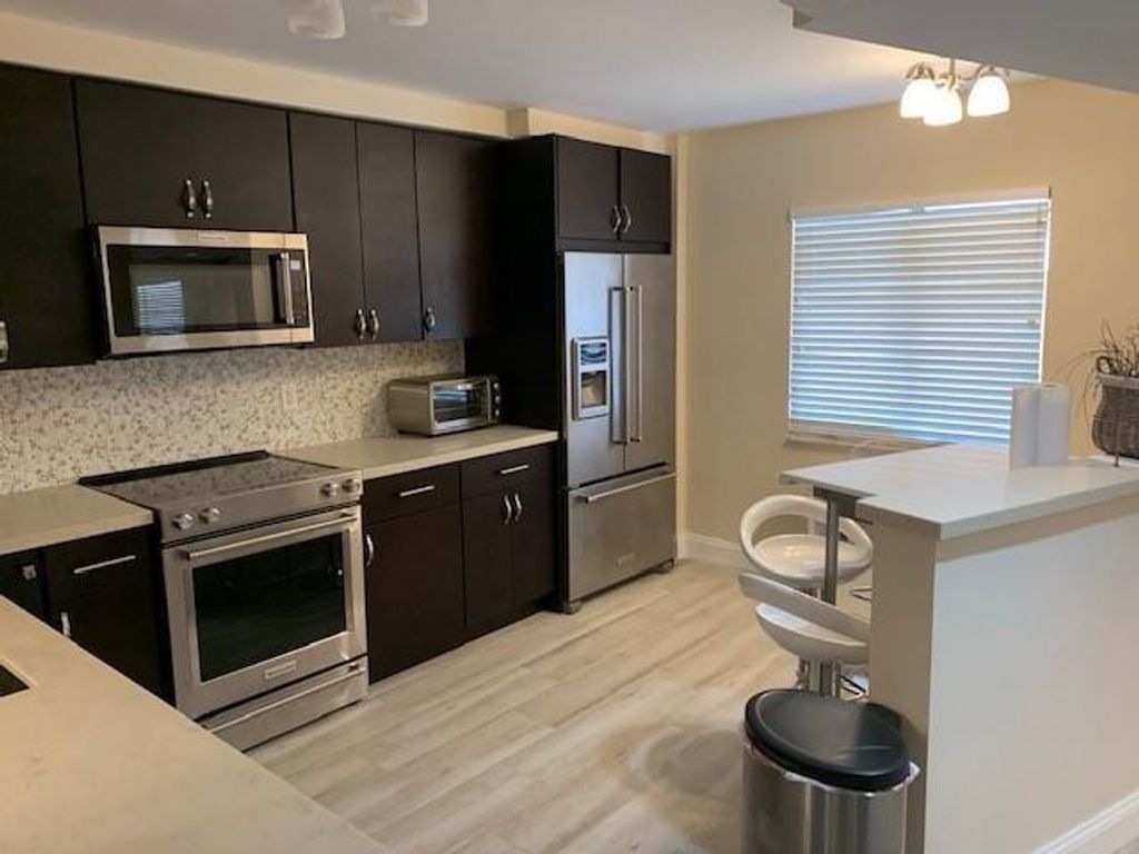 Photo of 2200 S Cypress Bend Drive #905, Pompano Beach, FL 33069 (MLS # F10555925)