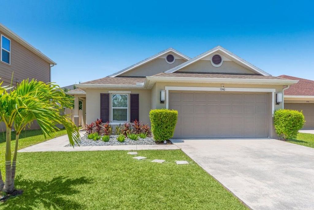 Photo of 5940 NW Pine Trail Circle, Port Saint Lucie, FL 34983 (MLS # R11119580)