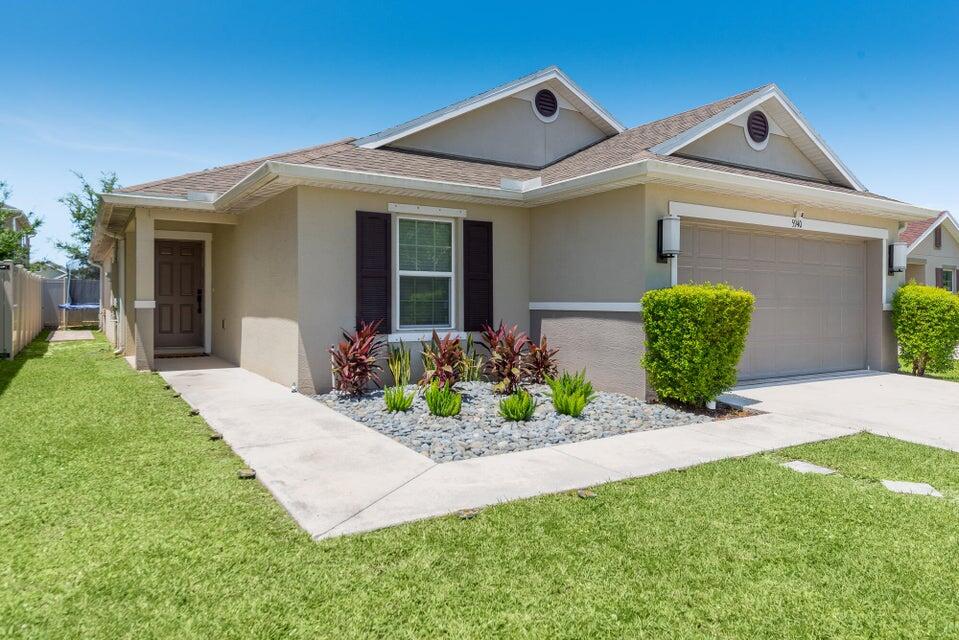 Photo of 5940 NW Pine Trail Circle, Port Saint Lucie, FL 34983 (MLS # R11119580)