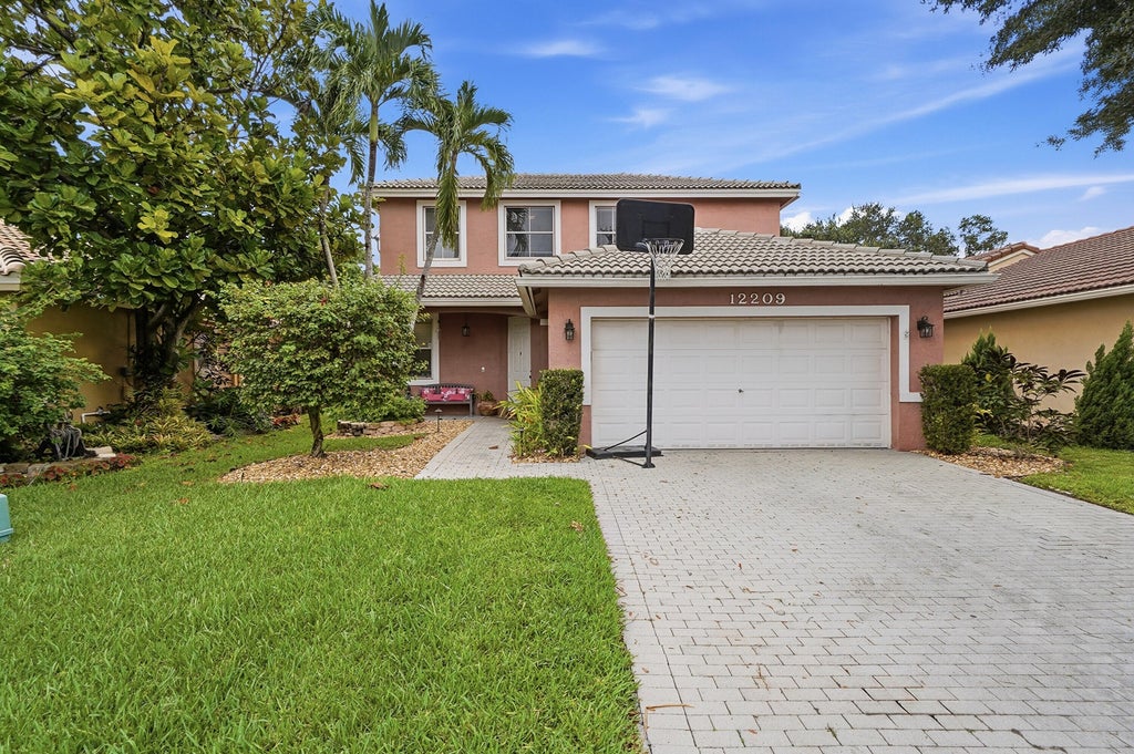 Photo of 12209 NW 57th Street, Coral Springs, FL 33076 (MLS # B26038099)