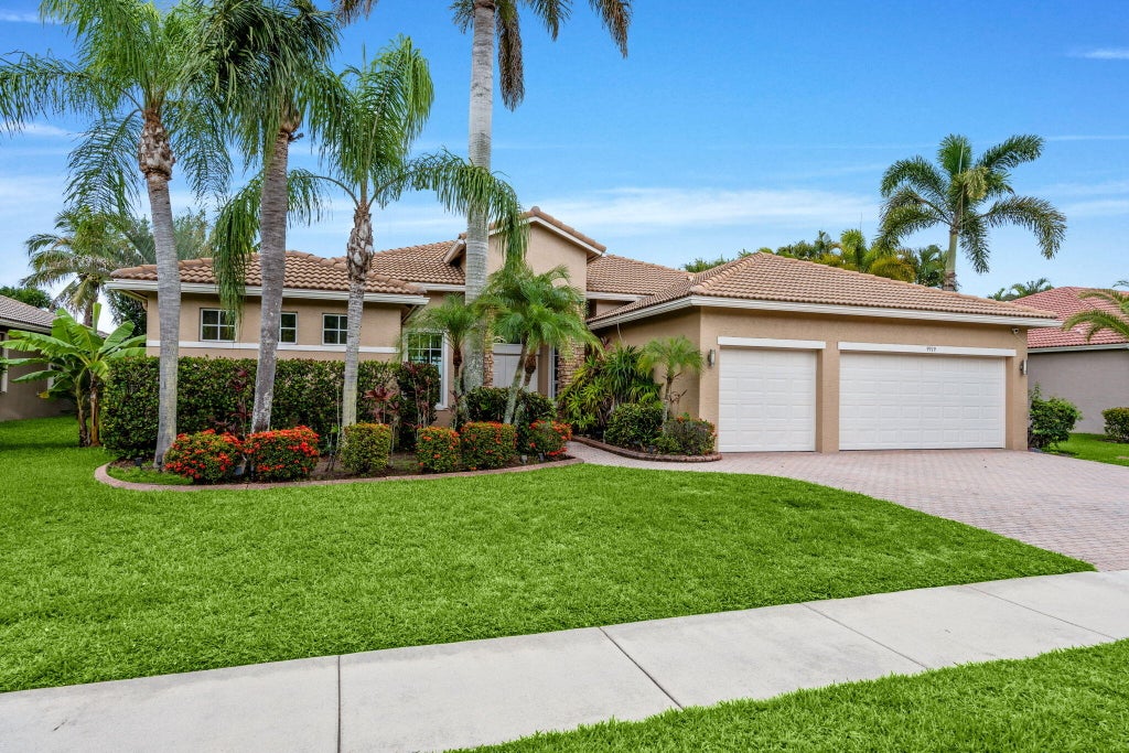 Photo of 9919 Royal Cardigan Way, West Palm Beach, FL 33411 (MLS # B26074613)