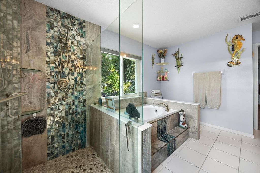 Photo of 1073 SW Placetas Avenue, Port Saint Lucie, FL 34953 (MLS # R11126261)