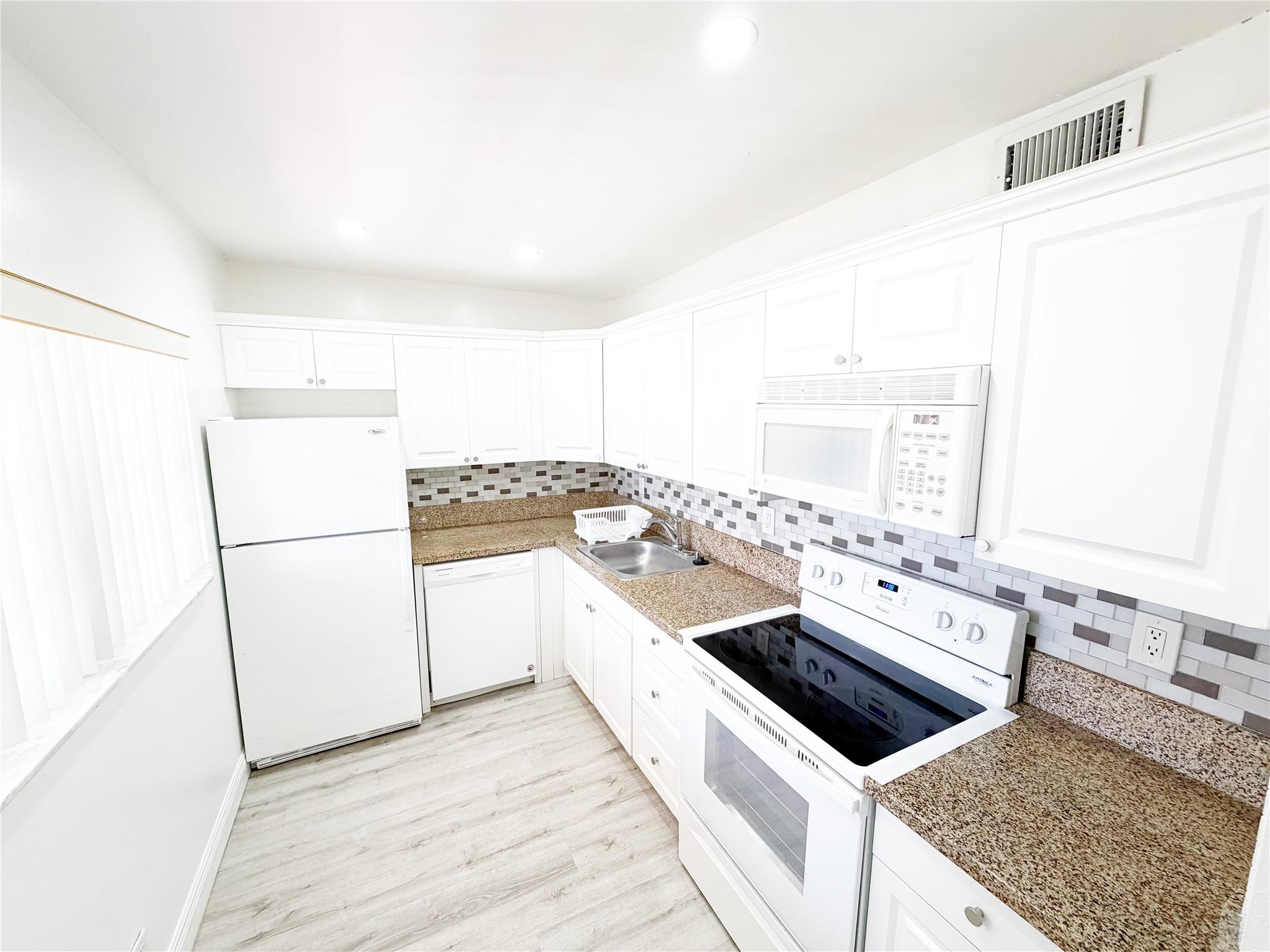 Coral Gardens Condo - Residential Lease