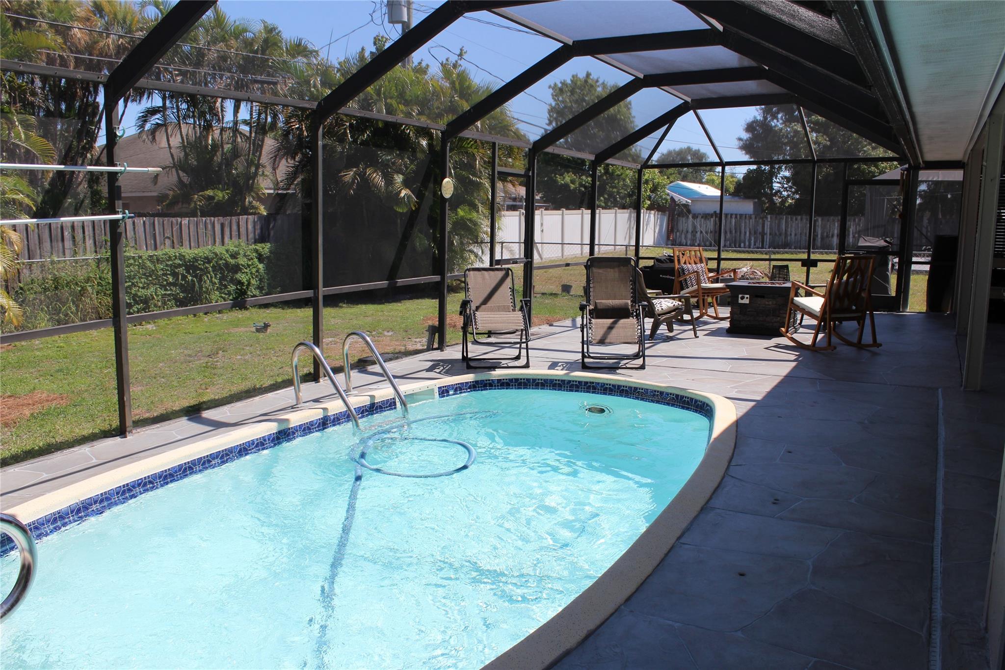 Beautiful and compelling pool home, come fall in love with this warm and fuzzy home. Swim and play all summer long, Fireplace, large fenced in back yard, big, beautiful bedrooms master has walk in closet, newer roof as of 1-27-23, New AC as of 1-23-24, large screened in pool, like new appliances, stunning flooring and so much more. We are priced to sell fast. Neet as a pin.