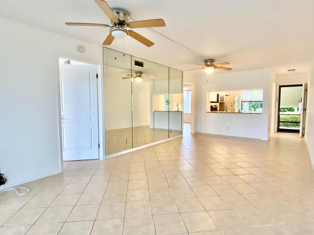 Photo of 6928 Briarlake Circle Circle #104, Palm Beach Gardens, FL 33418 (MLS # R11095752)