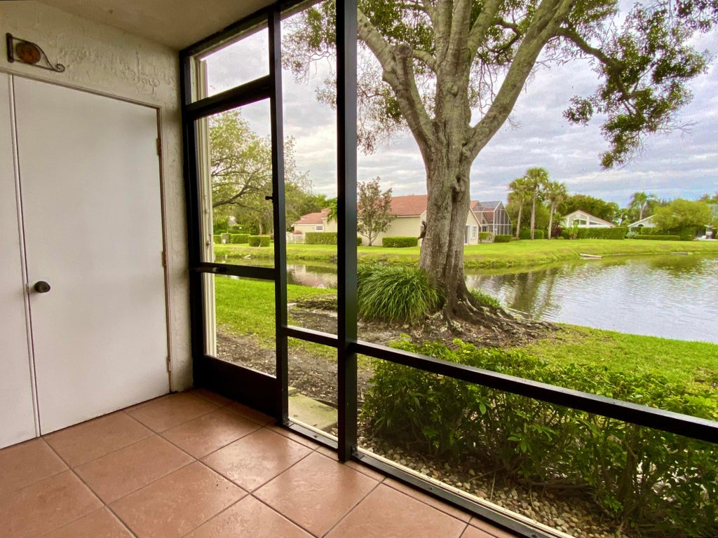 Photo of 6928 Briarlake Circle Circle #104, Palm Beach Gardens, FL 33418 (MLS # R11095752)