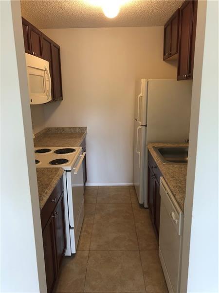 Palm Aire Gardens Condo - Residential Lease