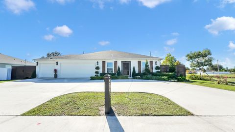Photo of 1382 SW Becker Road, Port Saint Lucie, FL 34953 (MLS # R11147134)