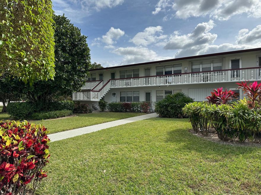 Welcome to this comfortable 1 bedroom, 1 bath condo on second floor located in Century Village, a lively 55+ community.  This unit features laminate flooring throughout, 2 window A/C units and the entire wall in Master Bedroom is closet space.  Enjoy the screened patio with lovely garden views off the bedroom. Century Village offers plenty of activities for the active lifestyle!  Pools, fitness, tennis, courtesy bus, shows, just to name a few! Must be 55+