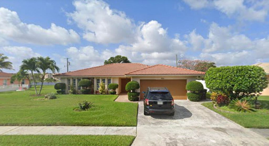 Photo of 401 S Mangonia Circle, West Palm Beach, FL 33401 (MLS # R10855307)