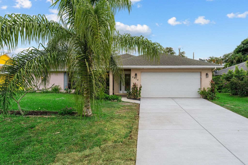 Photo of 2814 SE Pace Drive, Port Saint Lucie, FL 34984 (MLS # R11140473)