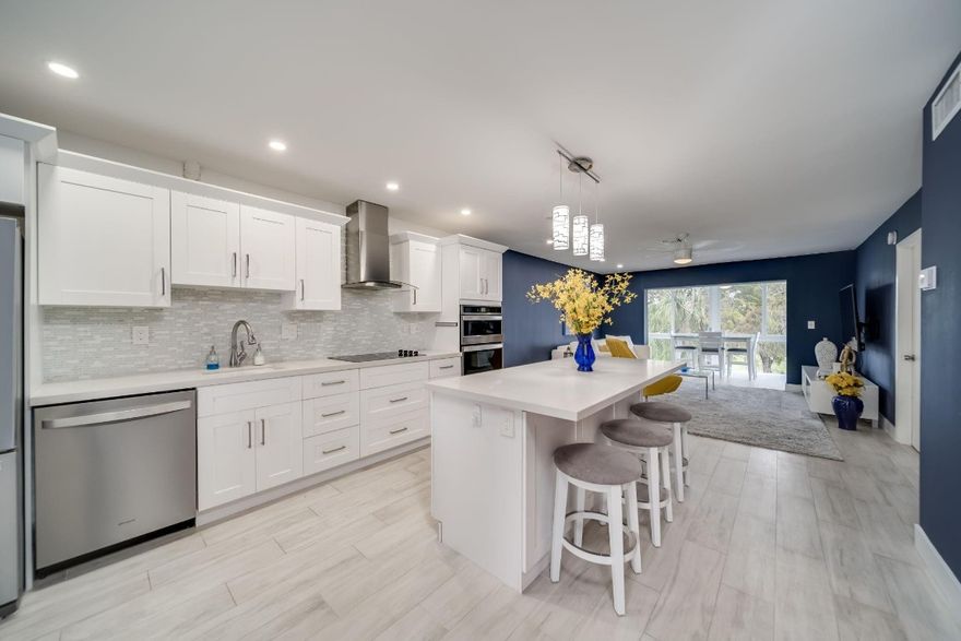This One Is A Must See! 2bd 2 Full Bath Corner Unit. Condo, In A 55+ Community. As You  Walk In Into This Fully Remodeled Luxurious Condo, You Will Find A Beautiful Open Plan Concept Design,  Serene &  Peaceful Golf Course Views! Clubhouse, Pool, Gym & Sauna Room Right Across The Building, High End Stainless-Steel Appliances, Quartz Countertop, Large Island, Beautiful White Shaker Cabinets,  Brand New Impact Windows Throughout. Gorgeous Wood-Like Tile Floors. The Building Has Passed Its 40y. Certification And Has A Brand New Roof. This Is The Best Looking Unit In The Complex!Ready To Enjoy Your Morning Coffee Or Simply Relax ..In Your Luxurious And Exquisite Enclosed Patio Overlooking Serene Golf Course Views? This One Is For Sure For The Pickiest Of Buyers!  Move Fast It Won't Last!!! This One Is A Must See! 2bd 2 Full Bath. Condo, In A 55+ Community. As You  Walk In Into This Fully Remodeled Luxurious Condo, You Will Find A Beautiful Open Plan Concept Design,  Serene &  Peaceful Golf Course Views! Clubhouse, Pool, Gym & Sauna Room Right Across The Building, High End Stainless-Steel Appliances, Quartz Countertop, Large Island, Beautiful White Shaker Cabinets,  Brand New Impact Windows Throughout. Gorgeous Wood-Like Tile Floors. The Building Has Passed Its 40y. Certification And Has A Brand New Roof. This Is The Best Looking Unit In The Complex!Ready To Enjoy Your Morning Coffee Or Simply Relax ..In Your Luxurious And Exquisite Enclosed Patio Overlooking Serene Golf Course Views? This One Is For Sure For The Pickiest Of Buyers!  Move Fast It Won't Last!!!