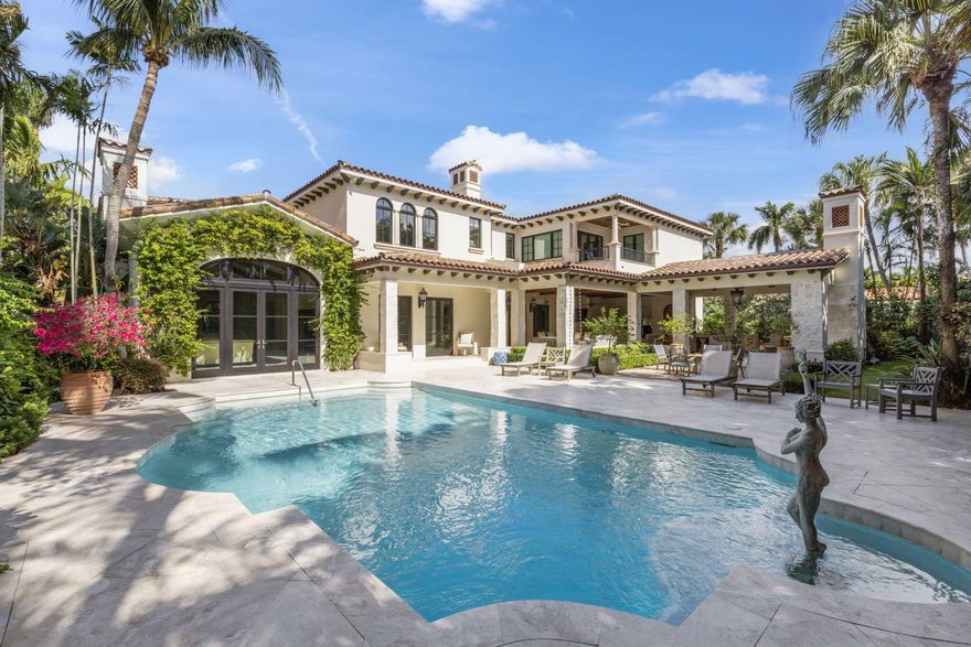 Beautifully reimagined 6 Bedrooms, 6 Full (3 Half) Bath estate situated in the Coveted Phipps Estates. This magnificent home had a renovation that was completed in 2022. The brick motor court leads you into an inviting entry with lush landscaping and a serene Koi pond. Soaring ceilings welcome you as soon as you walk through the main entry. You are immediately welcomed by a light and bright living room with views of the stunning backyard and large pool. The gourmet kitchen with top-of-the-line appliances is sure to please any aspiring chef. The spacious butler's pantry has a large walk-in, temperature-controlled wine cellar. The second floor features 5 bedrooms including the spacious primary suite. The home features an industrial elevator for easy access to the second floor.The