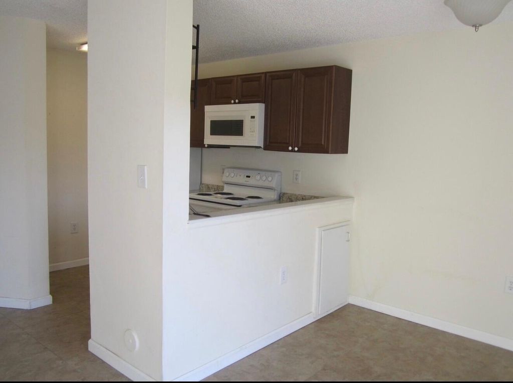 Photo of 7103 Glenmoor Drive, West Palm Beach, FL 33409 (MLS # R11157436)