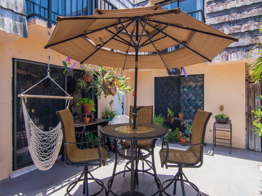 Welcome to Waverly Place! This charming home offers a fantastic opportunity for you to make it your own. Boasting 2 bedrooms and 2.5 remodeled baths, this residence ensures comfort and style. The property features a lovely courtyard, perfect for relaxing or entertaining. With a 2021 A/C system, newer water pipes, and a 2014 roof, you can enjoy peace of mind. The location is ideal, with close proximity to beaches and shopping centers. Don't miss out on the chance to personalize this wonderful home according to your taste and preferences.