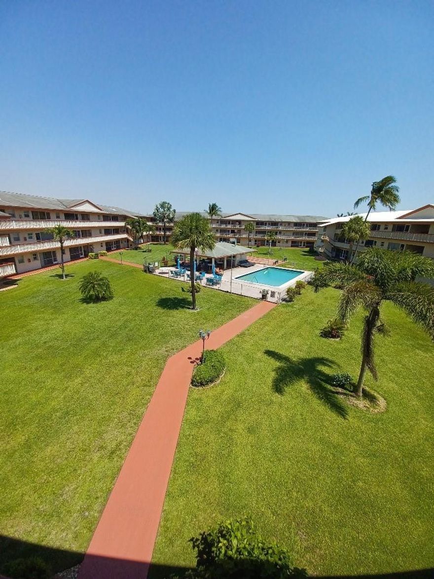 Corner unit gated 55+ community, great view of pool (each building has it’s own). Passed 50 year inspection, adequate money in reserves. Five miles from beach and boardwalk. Two miles from Hardrock Guitar Hotel featuring A-list celebrity performances. Small town feel with close proximity to I-95, FL TPKE, and I-75, as well as a 15 minute drive to FTL Airport and 30 minute drive to Miami Intl. Hurricane windows, tankless water heater. Elevator. On-site gym. Large storage locker. Community and surrounding quiet with green spaces. Quick access to major shopping and vibrant downtown in a city that just keeps getting better.HOA will be reduced by $35 next year due to assessment being fulfilled.