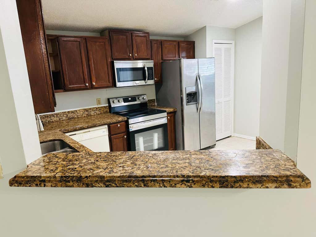 Photo of 5165 Foxhall Pl, West Palm Beach, FL 33417 (MLS # B26041305)