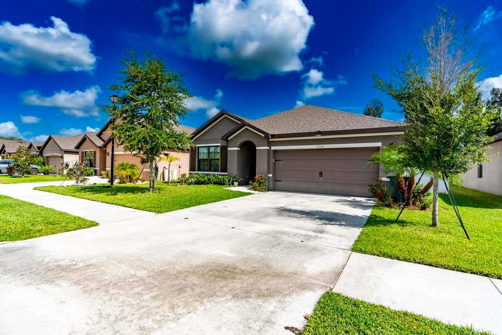 Photo of 5316 AMUSEMENT Avenue, Fort Pierce, FL 34947 (MLS # B26052393)