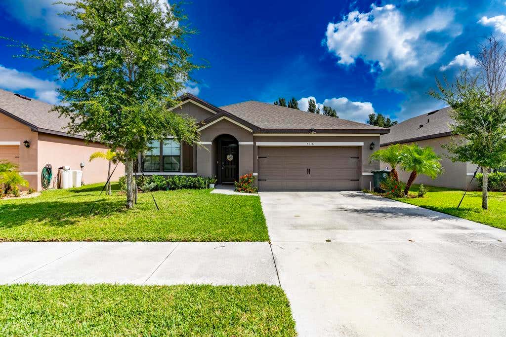 Photo of 5316 AMUSEMENT Avenue, Fort Pierce, FL 34947 (MLS # B26052393)