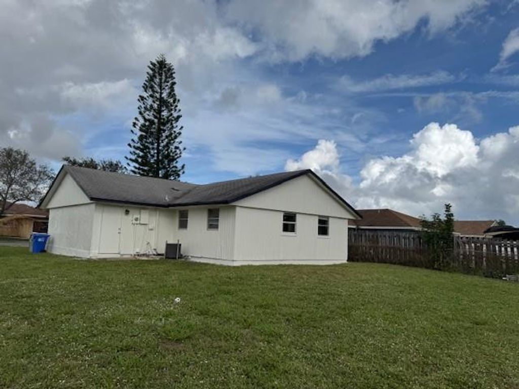 Photo of 788 NW 15th Place, Pompano Beach, FL 33060 (MLS # F10542101)