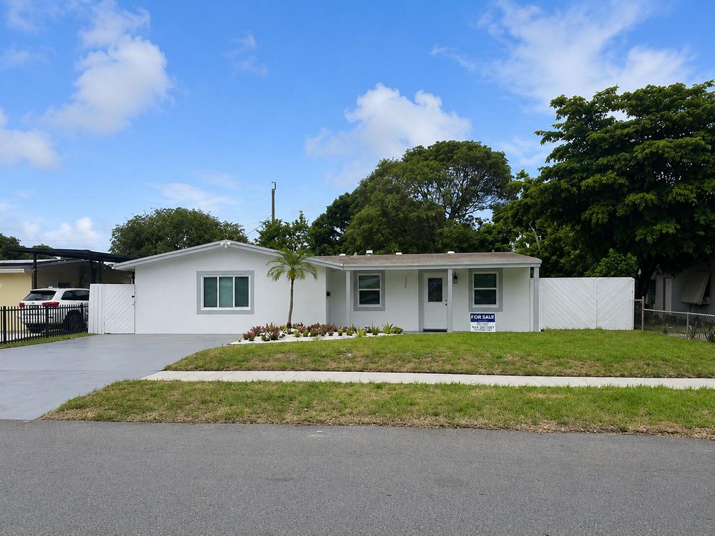Photo of 1558 NW 5TH Avenue, Pompano Beach, FL 33060 (MLS # B26053132)