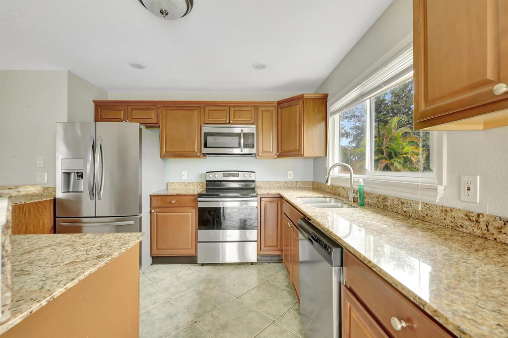 Photo of 1961 SE Redwing Circle, Port Saint Lucie, FL 34952 (MLS # R11020499)