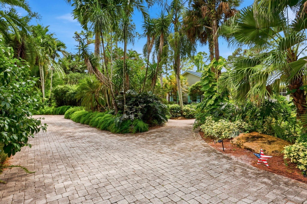 Photo of 16280 E Sycamore Drive, The Acreage, FL 33470 (MLS # B26086530)