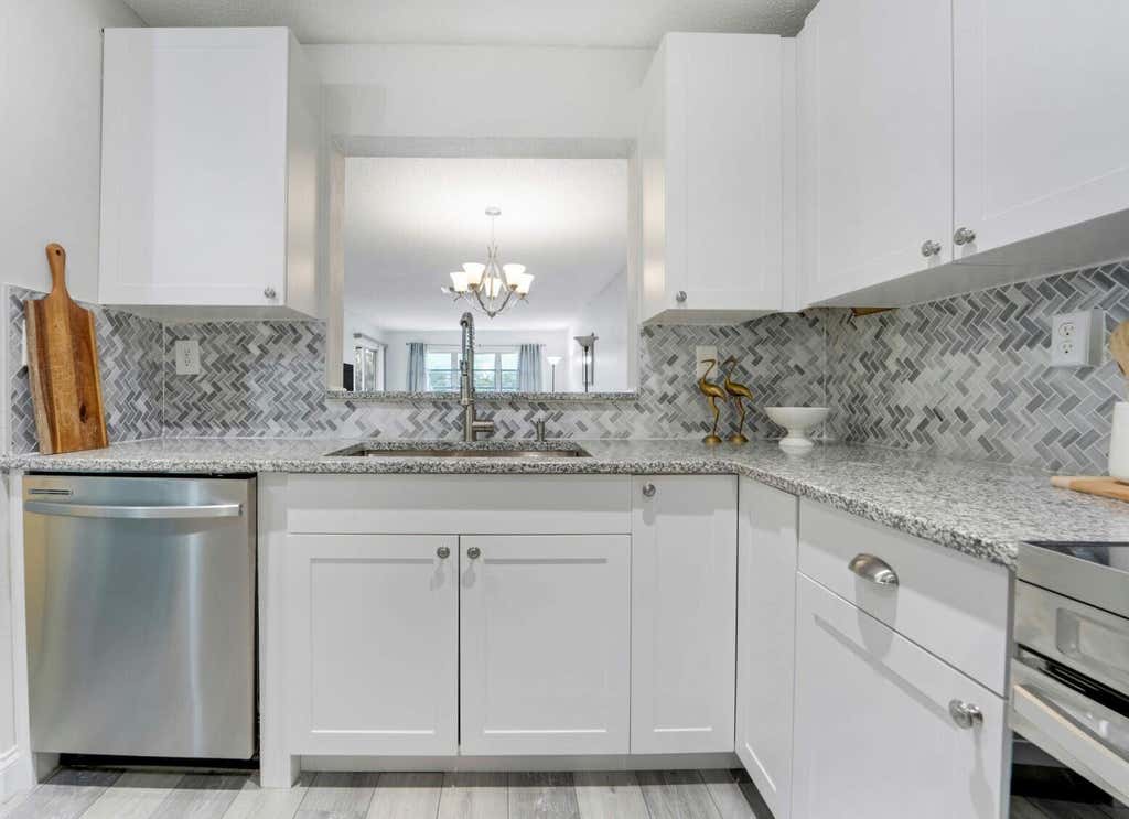 Photo of 5890 Sugar Palm Court #E, Delray Beach, FL 33484 (MLS # R11094251)