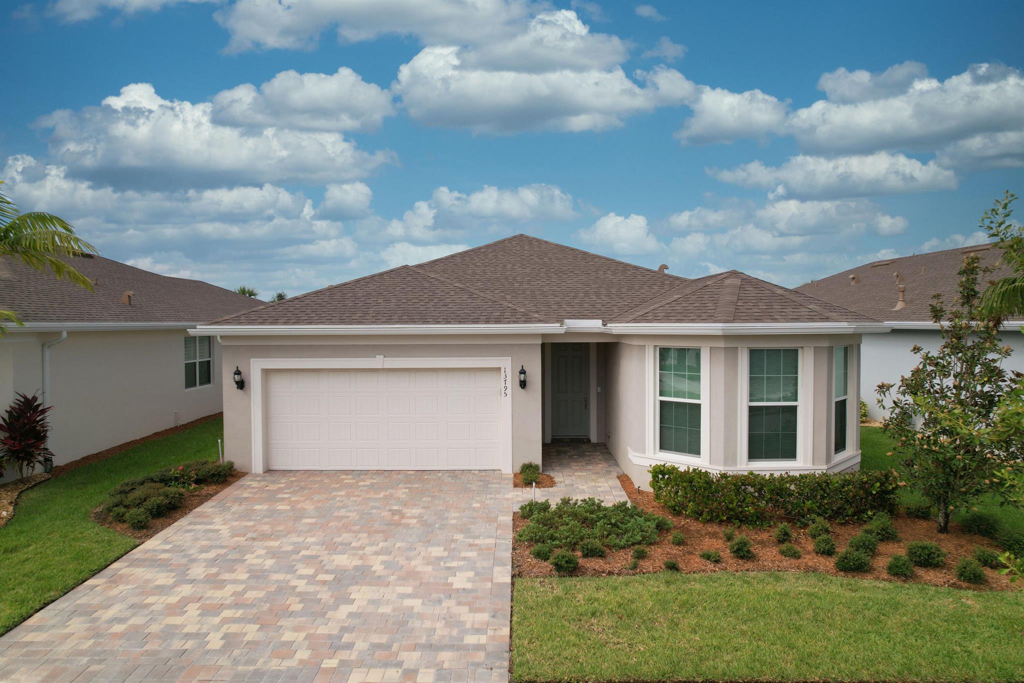 Gorgeous Palmary Model in Del Webb. Impact windows and doors. Wide Open Great Room. Huge, upgraded kitchen with Quartz countertops, White cabinets and tile backsplash. Lots of counterspace plus spacious walk-in pantry. This home is perfect for entertaining. Tile in the entire home. 8ft doorways. Master bath has large zero entry shower easy to enter. Big master walk-in closet. Flex room great for den or office. Screened patio overlooks private backyard. Active 55+ community with 2 clubhouses, 2 pools, pickleball, tennis, putting green, dog park, walking trail around the lake. Full time Lifestyle Director for lots of entertainment.
