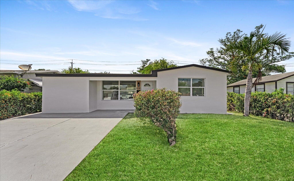 Photo of 824 S F Street, Lake Worth, FL 33460 (MLS # B26041994)