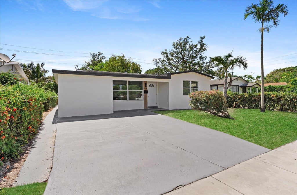 Photo of 824 S F Street, Lake Worth, FL 33460 (MLS # B26041994)