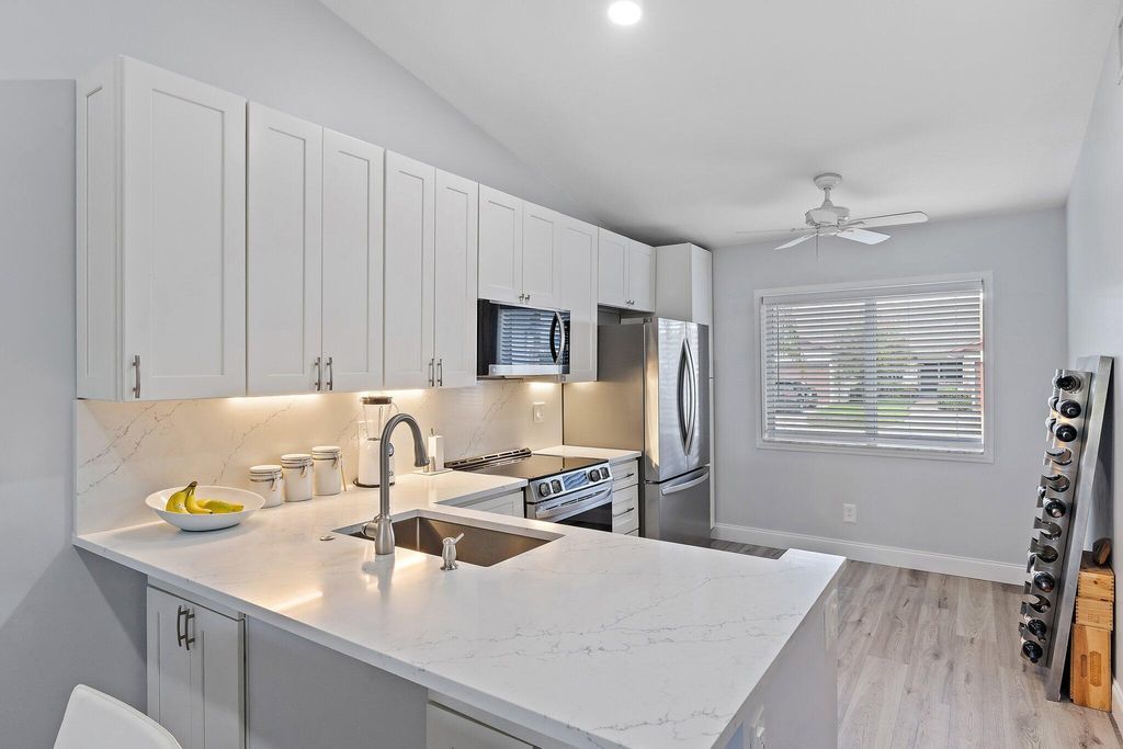 Photo of 128 Moccasin Trail S, Jupiter, FL 33458 (MLS # R11126817)