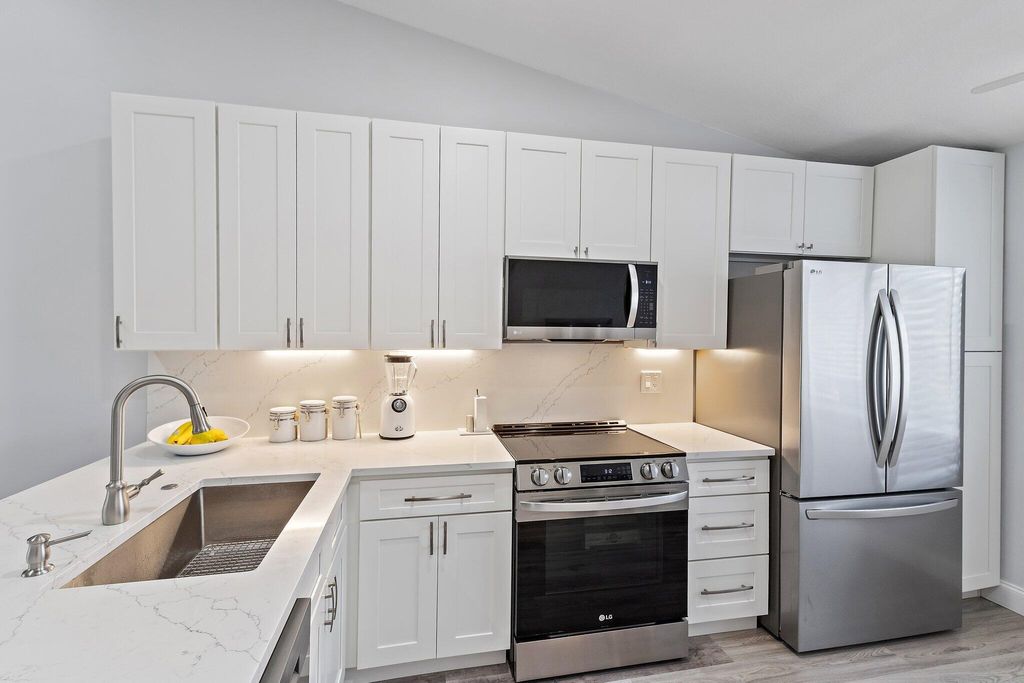 Photo of 128 Moccasin Trail S, Jupiter, FL 33458 (MLS # R11126817)