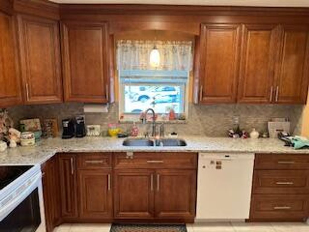 Photo of 676 Laconia Circle #B, Lake Worth, FL 33467 (MLS # R11148627)