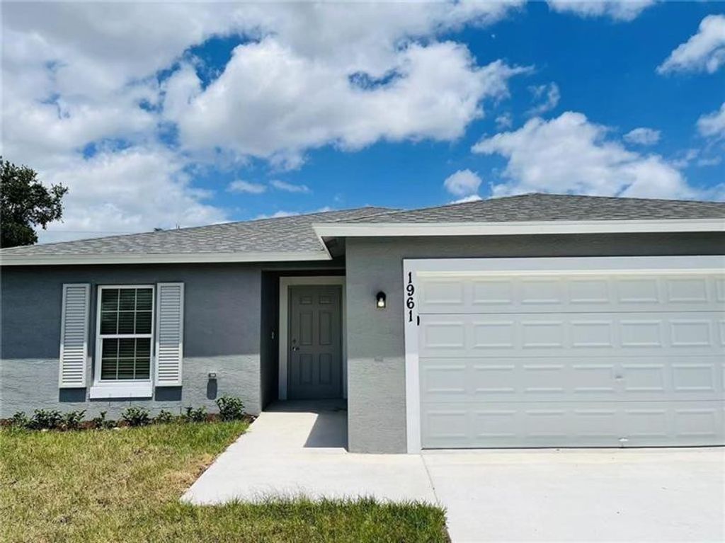 Photo of 1961 SW Michelangelo Avenue, Port Saint Lucie, FL 34953 (MLS # F10496958)