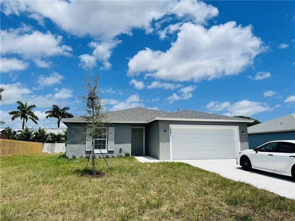 Photo of 1961 SW Michelangelo Avenue, Port Saint Lucie, FL 34953 (MLS # F10496958)