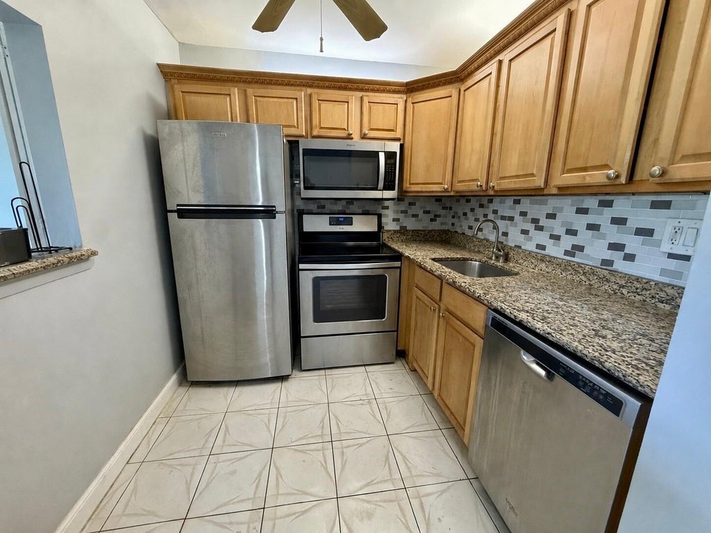 Photo of 261 Suffolk, Boca Raton, FL 33434 (MLS # B26039365)