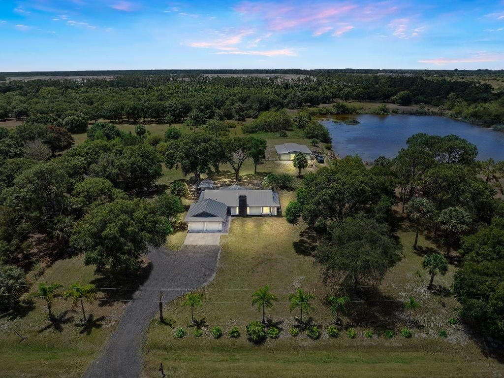 Photo of 11861 Palomino Drive, Port Saint Lucie, FL 34987 (MLS # R10993578)