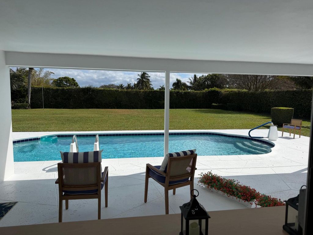 Photo of 10124 Seagrape Way, Palm Beach Gardens, FL 33418 (MLS # B26020317)