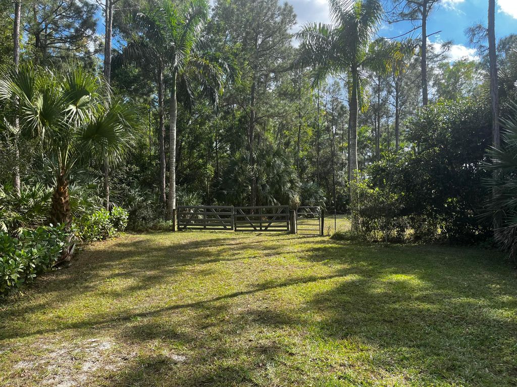 Photo of 0 75 Place N, The Acreage, FL 33470 (MLS # R11060249)