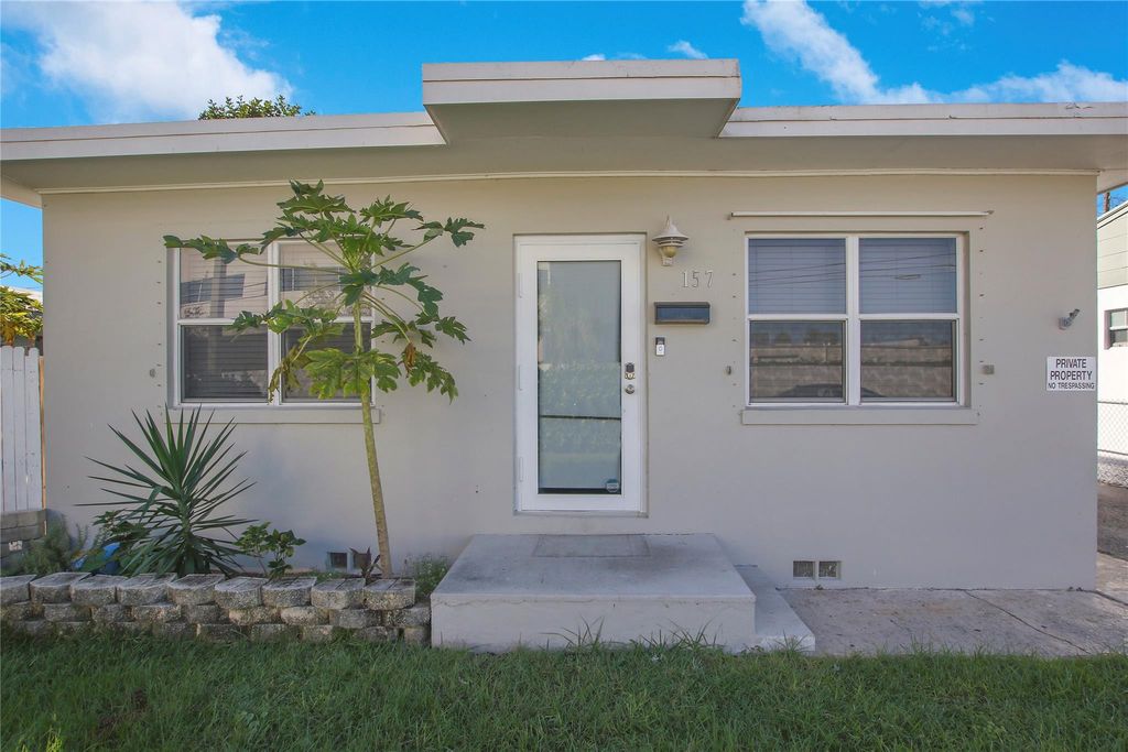 Photo of 157 E 25th Street, Riviera Beach, FL 33404 (MLS # B26019203)