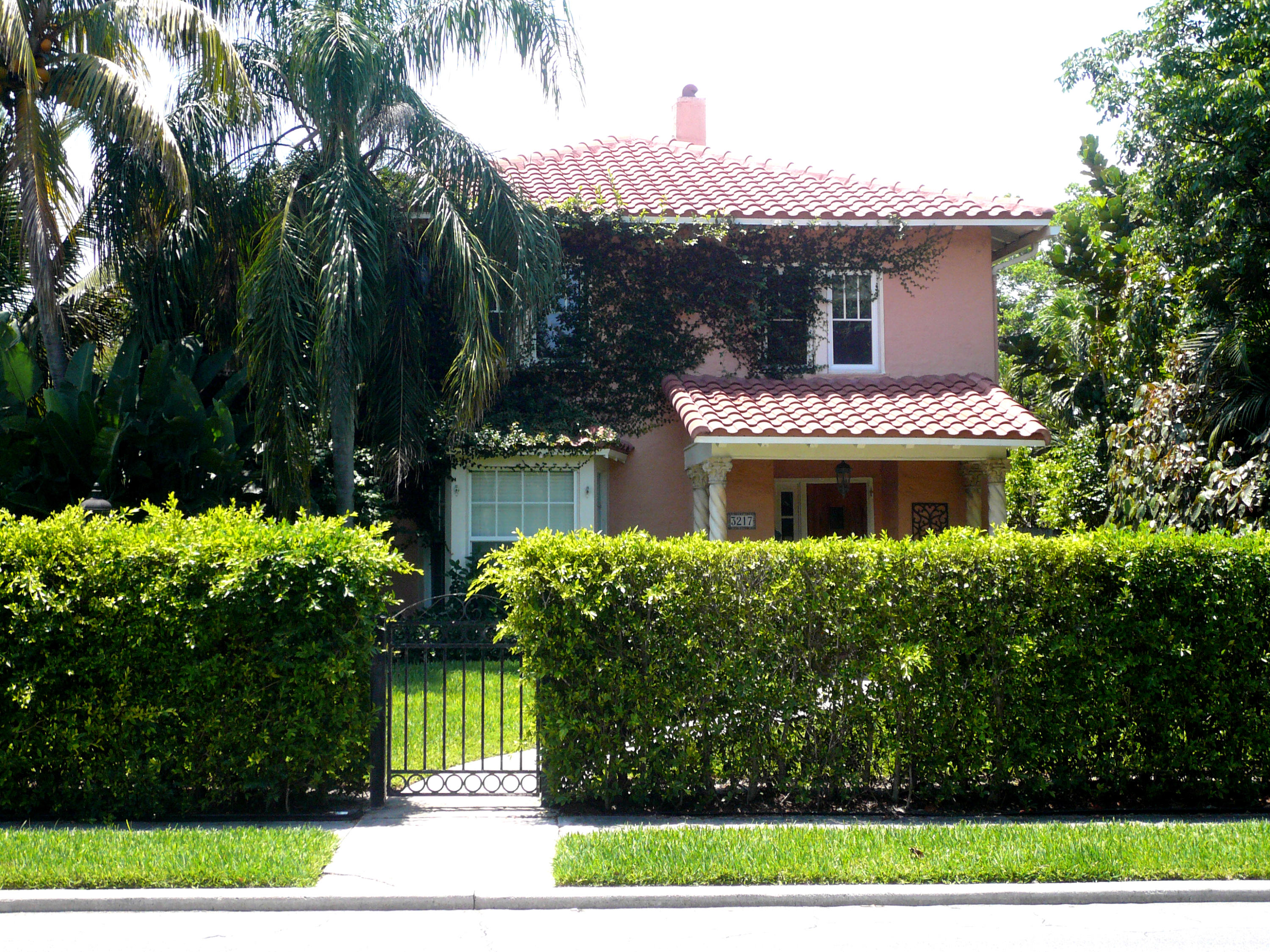 Beautifully restored, historic, Mediterranean style home located just across the bridge from Palm Beach. 3 bedrooms, 3 full baths, updated kitchen, laundry room, hardwood floors, fireplace, original hardwood floors, covered patio, 2-car garage with efficiency apartment, hurricane impact windows & doors, security cameras, fenced-in yard, lots of interior & exterior details. One block from the intra-coastal waterway. Immediate occupancy.