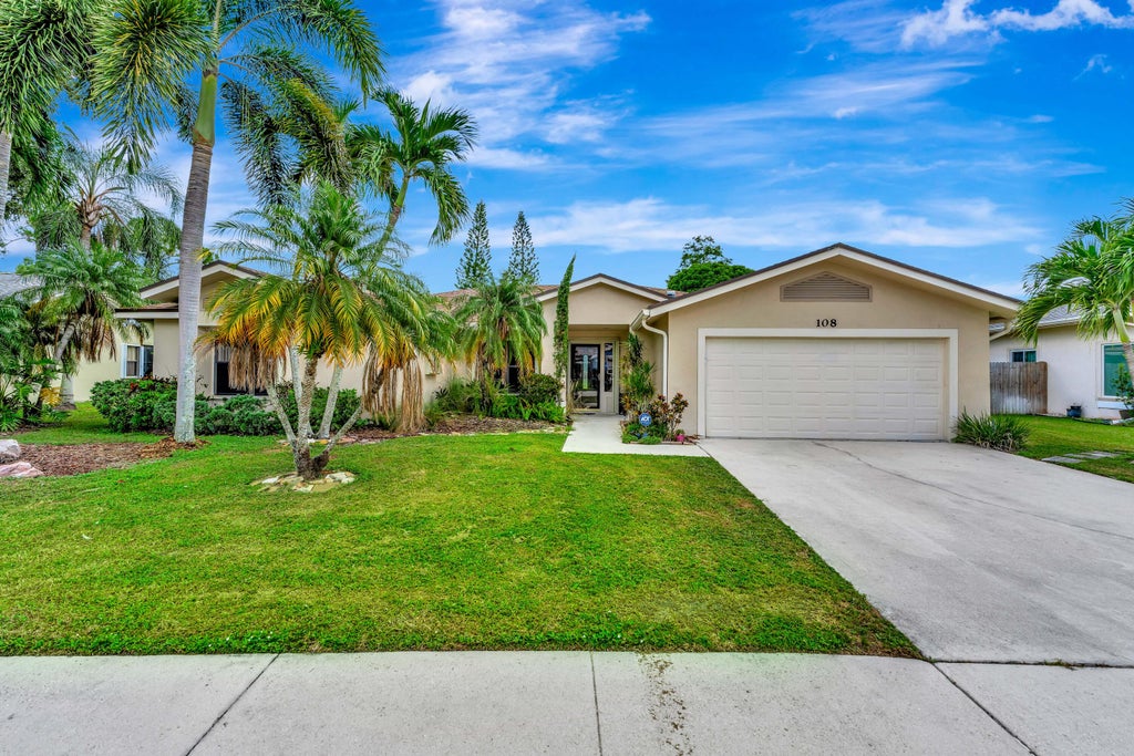 Photo of 108 Lexington Drive, Royal Palm Beach, FL 33411 (MLS # B26064523)
