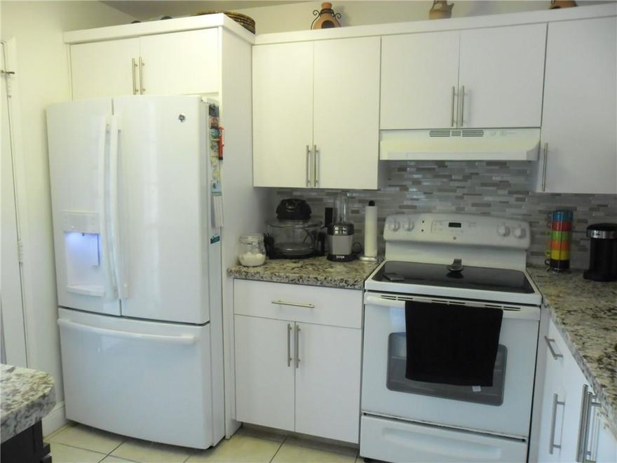 This corner unit has been updated to the max! Everything is top of the line and in pristine condition.  The 55+ gated community of Wynmoor has everything you want including  tennis, pickleball , pool, golf, restaurant, beautiful well-kept grounds, 24-hr security, Medical doctor on site, daily transportation to shopping, restaurants & medical centers.   A must see, don't miss out on this one, a real gem!