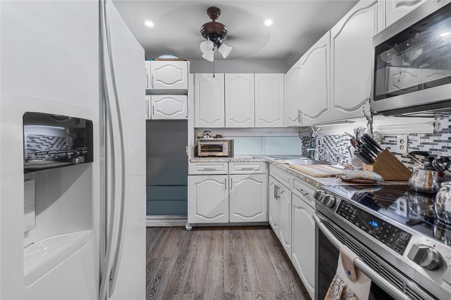 Updated, spacious, and rarely available corner unit located in the Oakbrook 55+ community. Renovated in 2018, this 2-bedroom, 2-bath condo offers a desirable layout with extra windows providing ample natural light, along with impact windows installed in 2025. The building features a newly completed roof (2025), adding long-term value. Community amenities include ample resident and guest parking, a welcoming lobby, clubhouse hall, fitness center, library, tennis and shuffleboard courts, large pool and patio area, on-site laundry facility with new machines, and peaceful walkways. Conveniently located near shopping, dining, medical facilities, and major roadways. Move-in ready and a must-see opportunity, don’t miss this one!