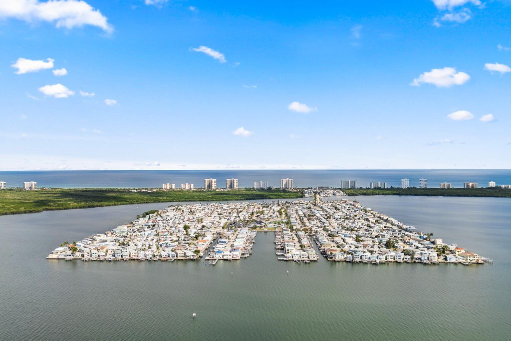 Photo of 447 Nettles Boulevard, Jensen Beach, FL 34957 (MLS # R11142699)