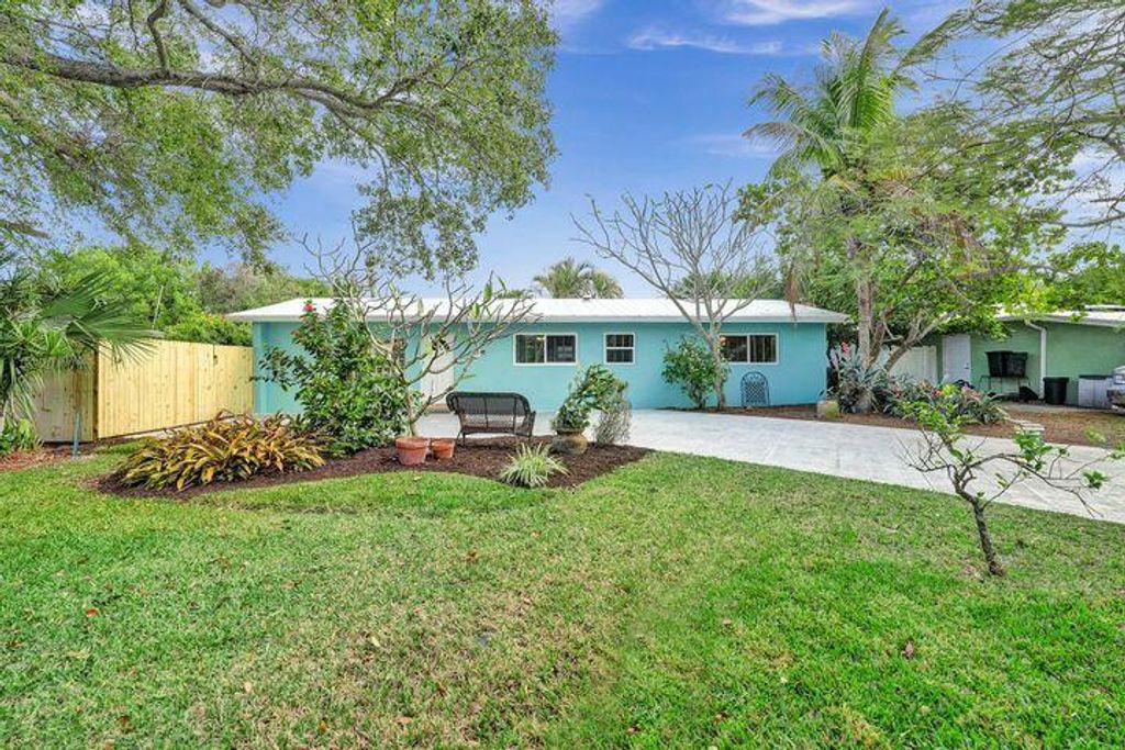 Photo of 367 W Riverside Drive, Tequesta, FL 33469 (MLS # R10859894)